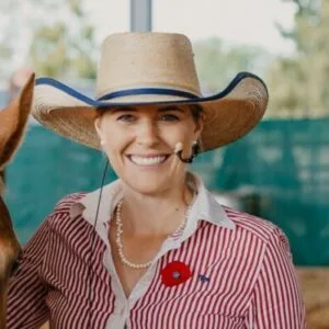 Annabel Curtain wearing cowboy hat and red striped shirt at Katherine Outback Experience.