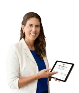 Fab Wintle holding a tablet showing Tourism Tribe tools