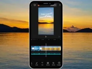 Mobile phone showing CapCut video editor with sunset footage and text overlay.