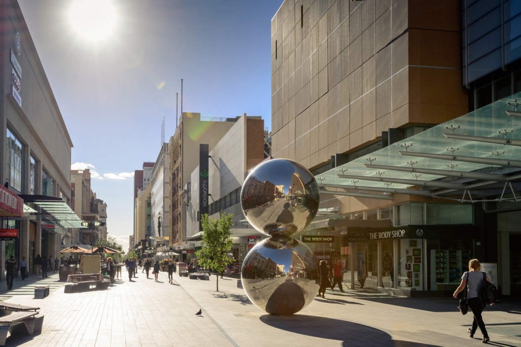 ADELAIDE, SOUTH AUSTRALIA - 27 January 2015: Rundle Mall looking east with pedestrians in the evening. Rundle Mall is the center of in the Adelaide city and the premier shopping area of South Australia with 23 million visitors annually.